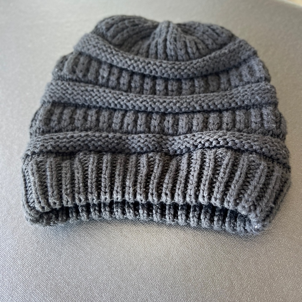 Gray Knit Winter Hat with Ribbed Band and Textured Patterns